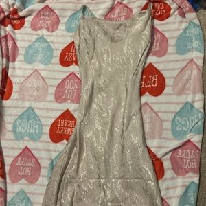 Size xs from express and it’s pretty long